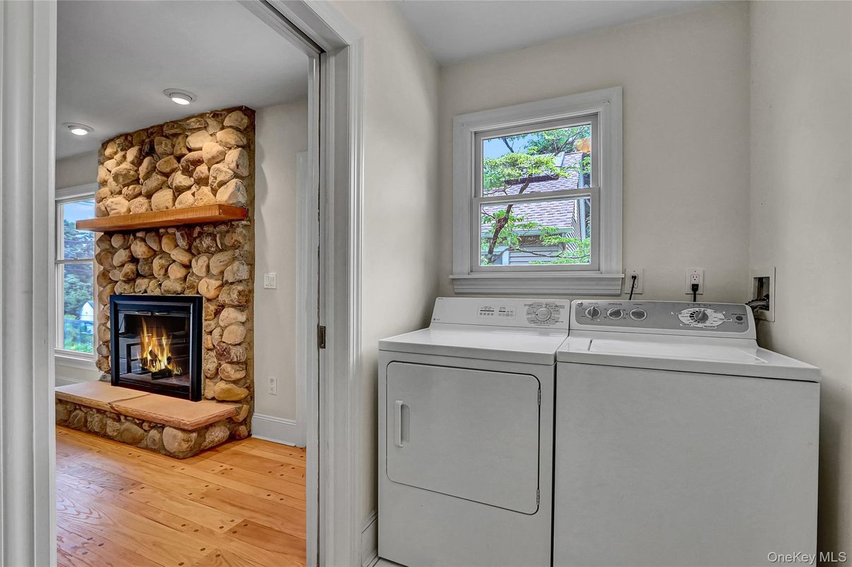 Fireplace, Interior, Recessed Lighting, Stone Walls, Utility Closets, Washer, Wood Texture Flooring