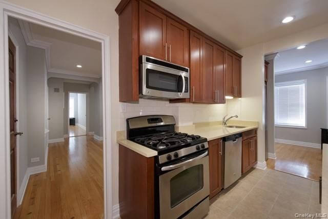 Interior, Kitchen, Recessed Lighting, Stainless Steel Appliances, Wood Texture Flooring