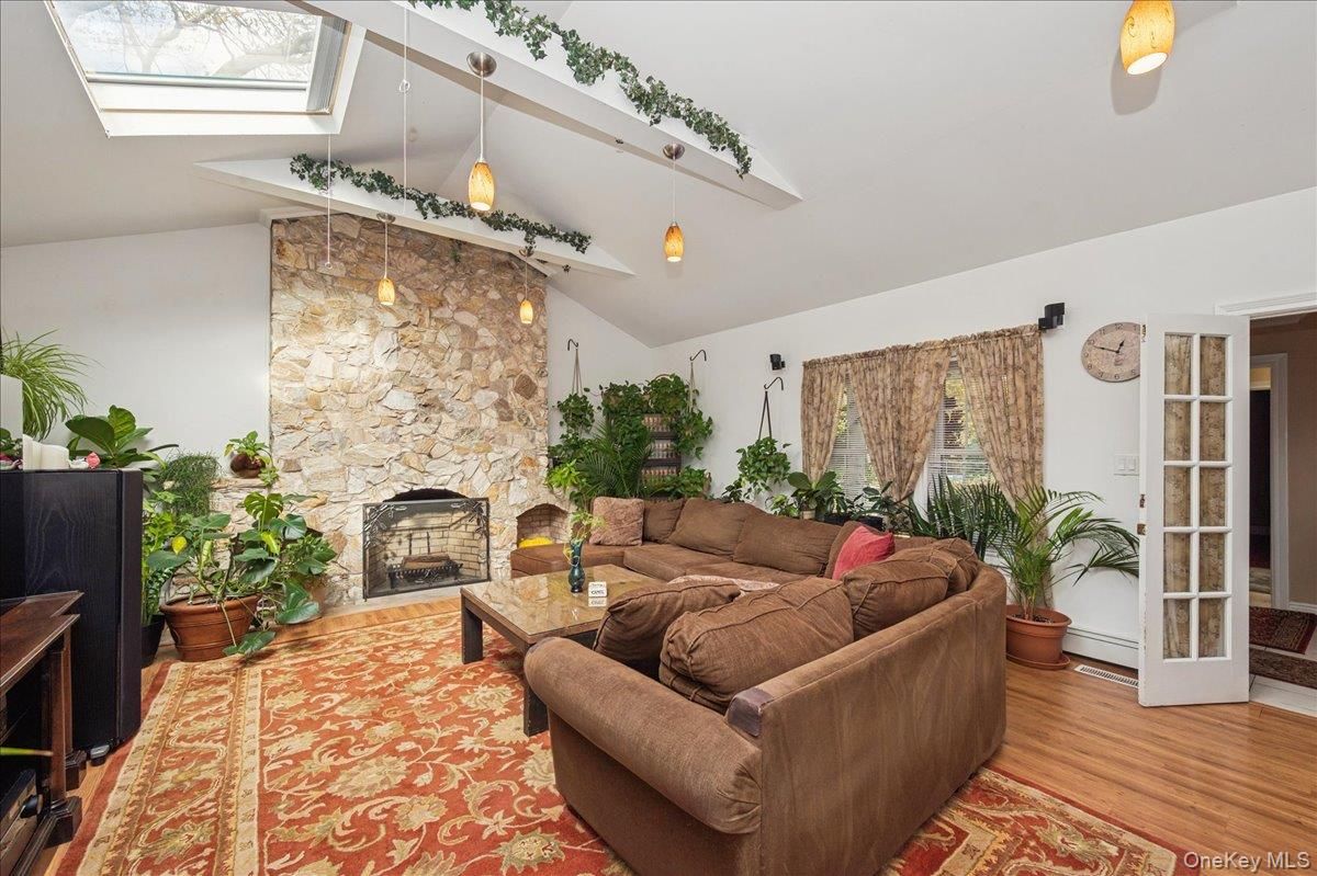 Fireplace, Interior, Living room, Pendant Lights, Stone Walls, Wood Texture Flooring