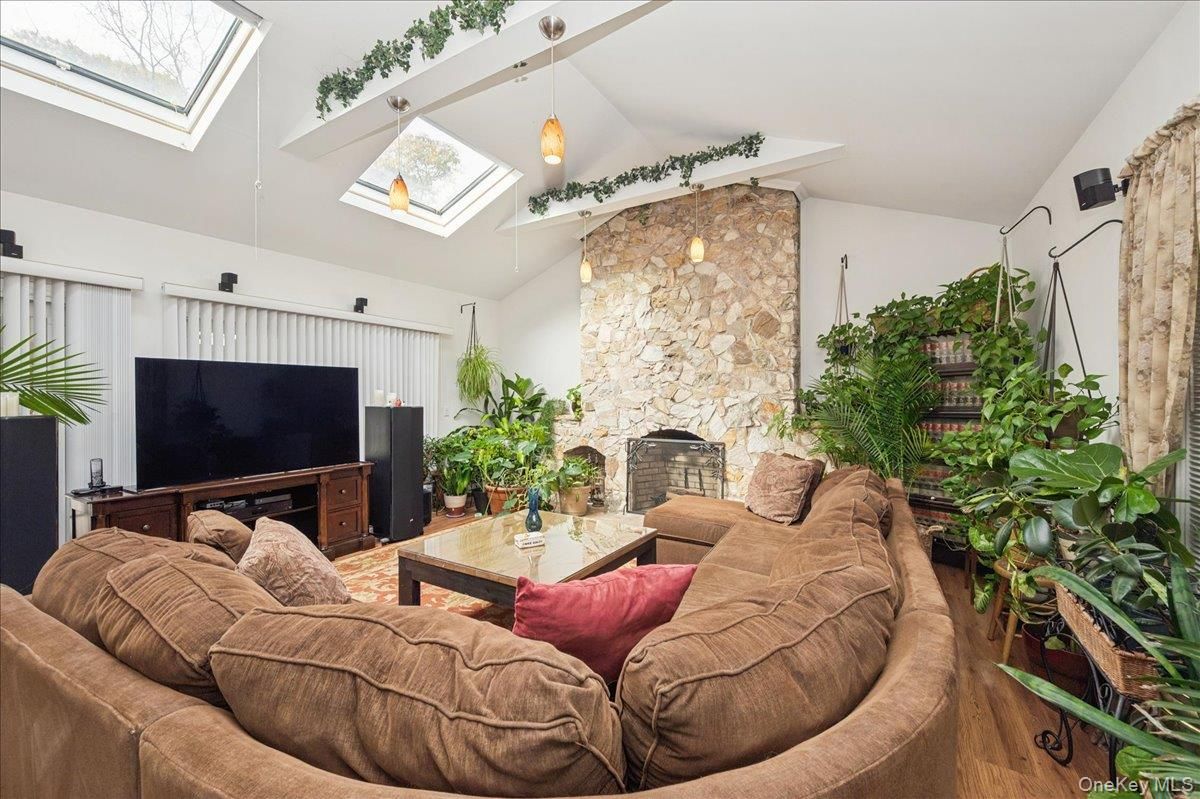 Fireplace, Interior, Living room, Pendant Lights, Stone Walls, Wood Texture Flooring