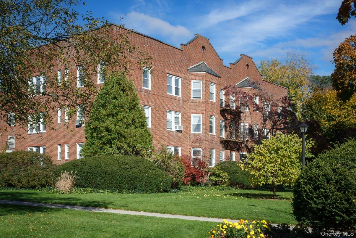 Exterior, Facade, Brick Facade, Condo Building