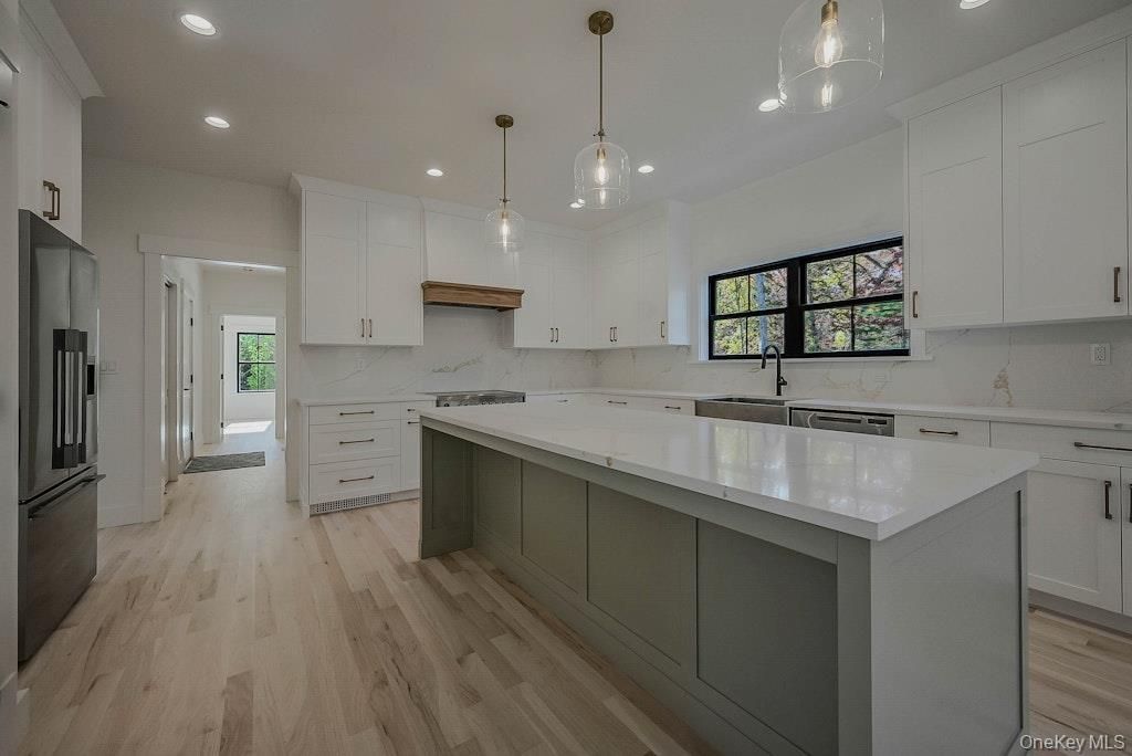 Interior, Kitchen, Marble Walls, Pendant Lights, Recessed Lighting, Wood Texture Flooring