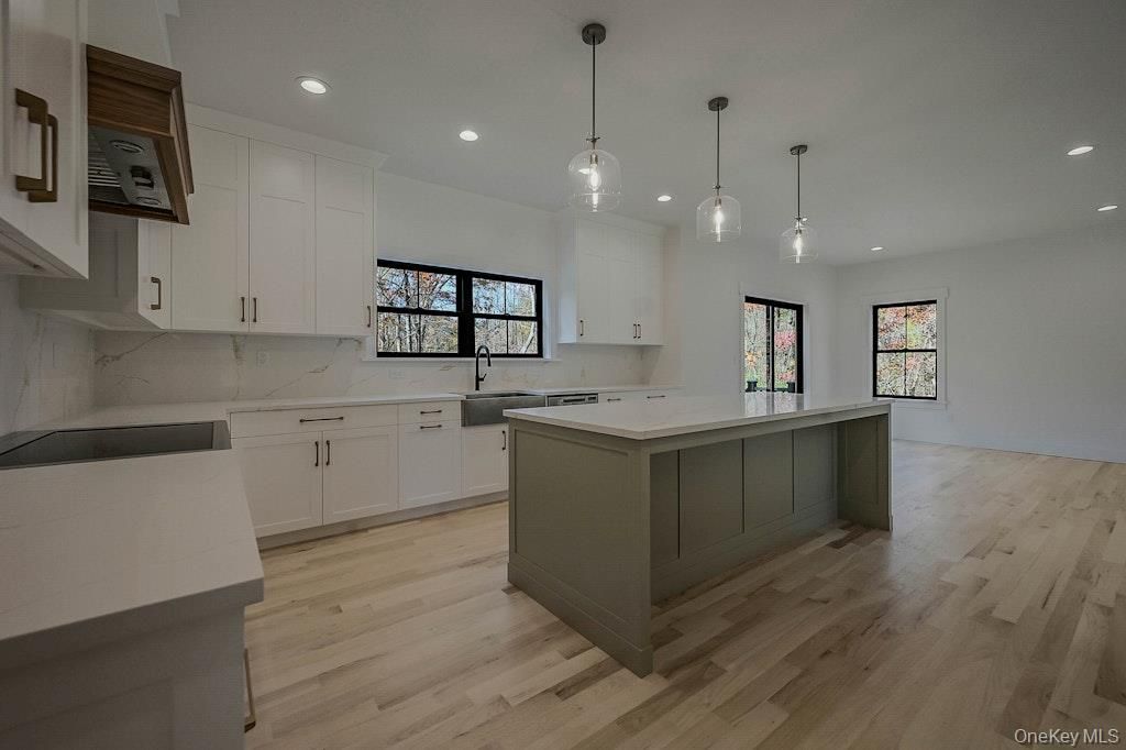 Interior, Kitchen, Marble Walls, Pendant Lights, Recessed Lighting, Wood Texture Flooring