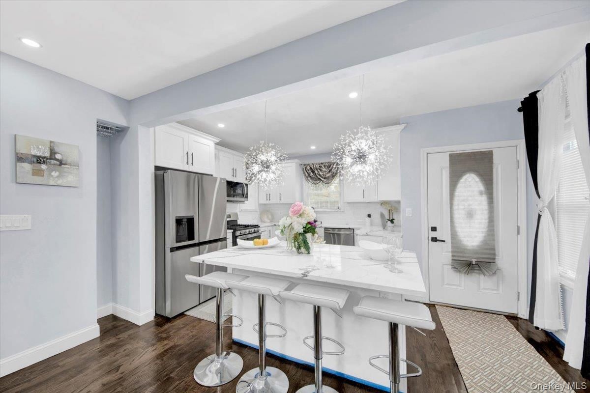 Chandelier, Interior, Kitchen, Recessed Lighting, Stainless Steel Appliances, Wood Texture Flooring