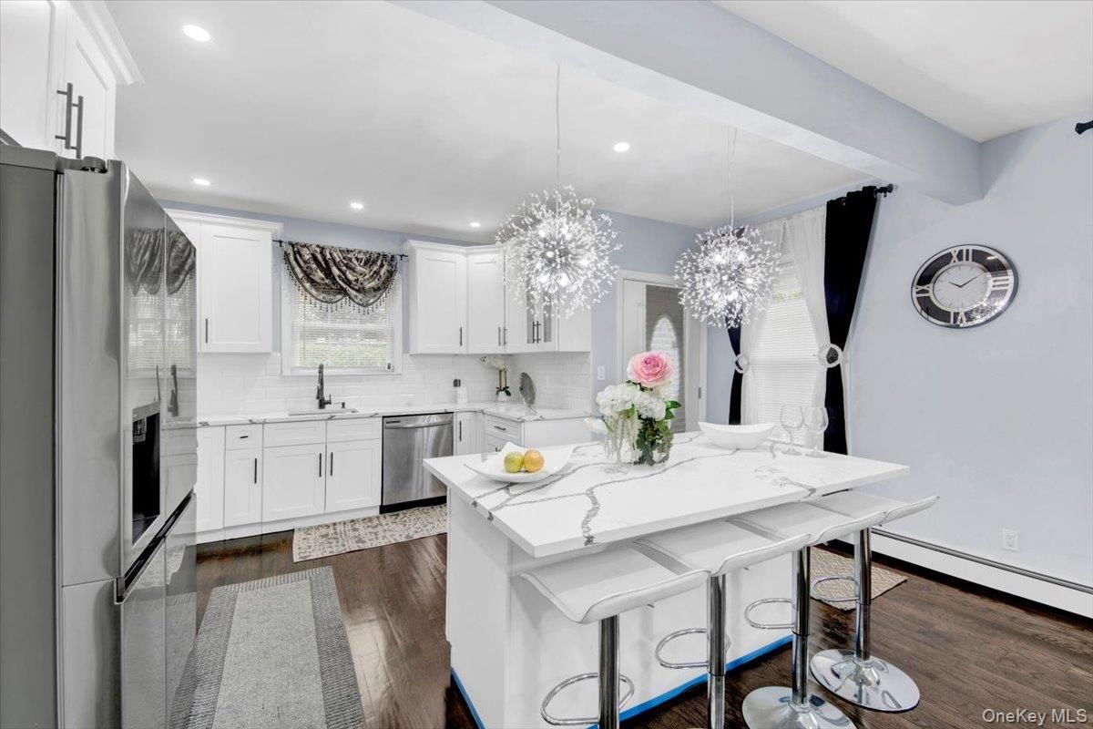 Chandelier, Interior, Kitchen, Recessed Lighting, Stainless Steel Appliances, Wood Texture Flooring