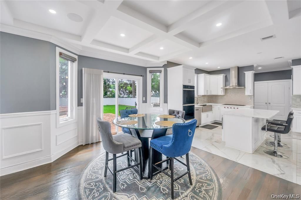 Dining room, Interior, Kitchen, Recessed Lighting, Stainless Steel Appliances, Wood Texture Flooring