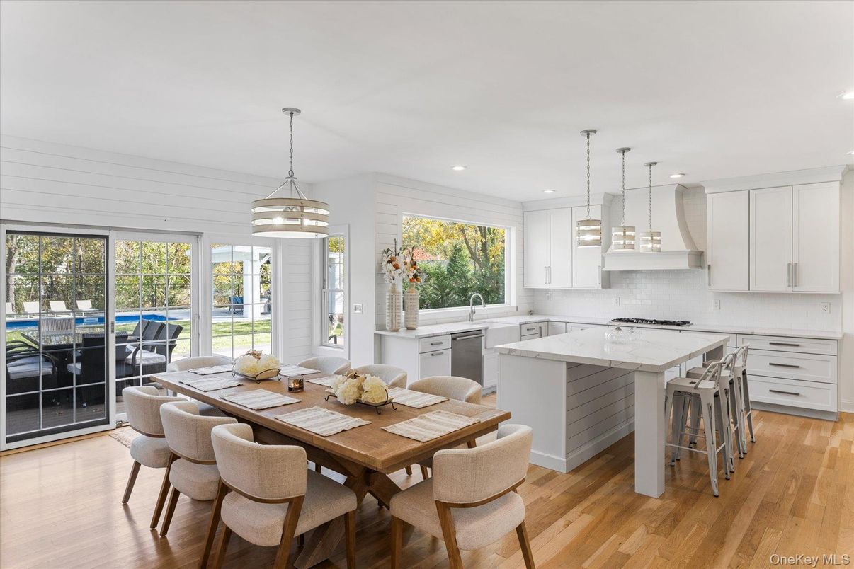 Dining room, Interior, Kitchen, Pendant Lights, Recessed Lighting, Stainless Steel Appliances, Wood Texture Flooring