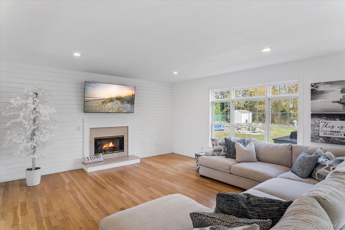 Fireplace, Interior, Living room, Recessed Lighting, Wood Texture Flooring