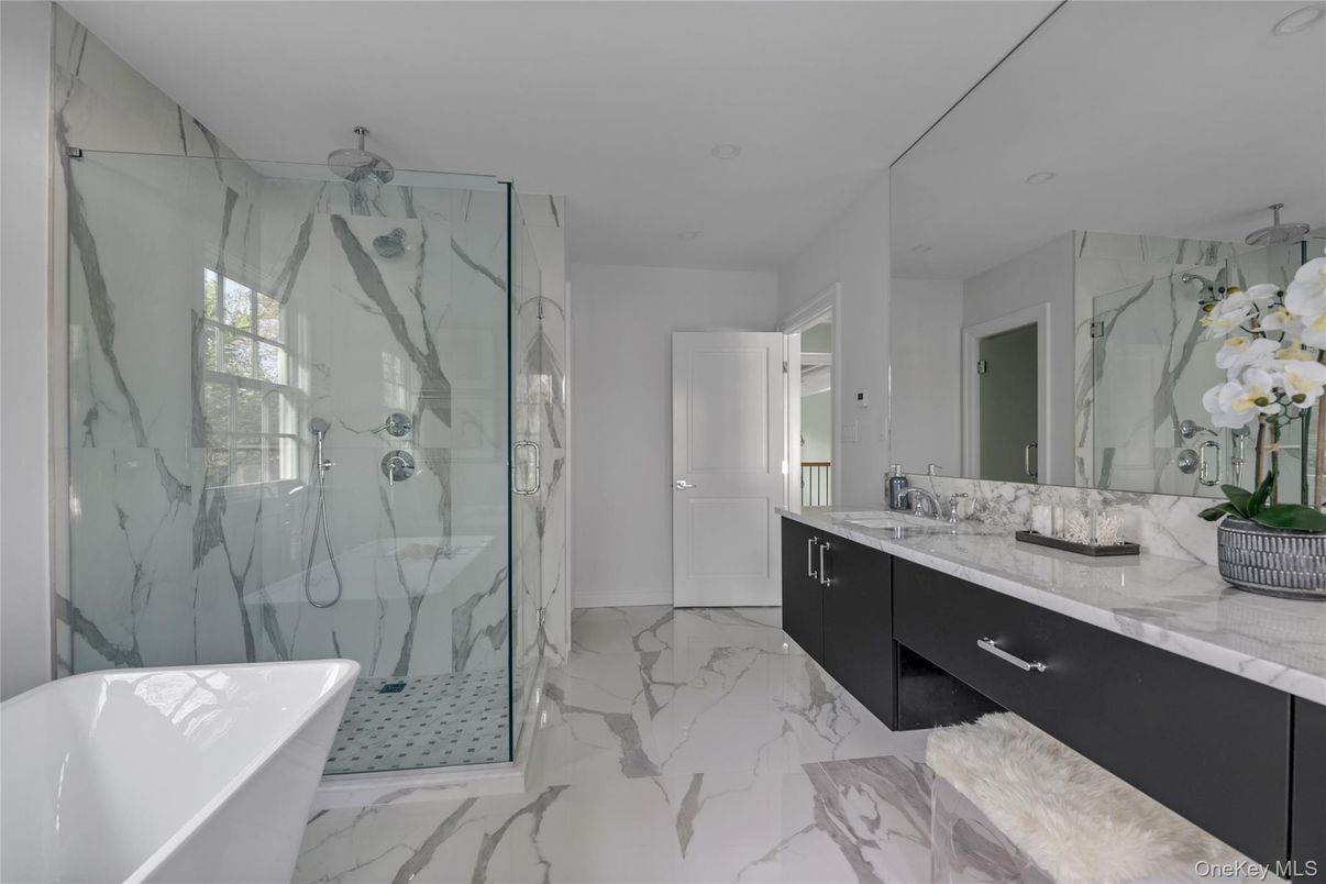 Bathroom, Dual Sink Vanities, Free Standing Baths, Glass Shower, Interior, Marble, Marble Walls, Recessed Lighting