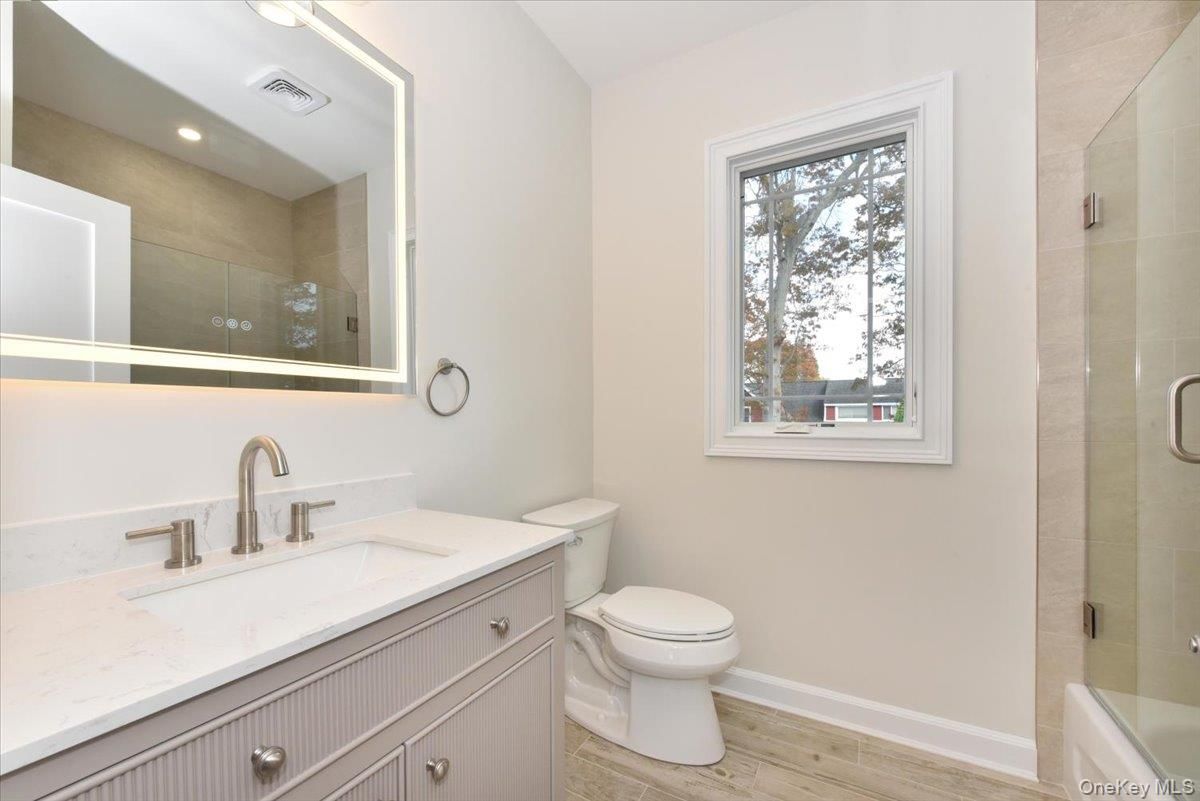 Bathroom, Glass Shower, Interior, Recessed Lighting, Wood Texture Flooring