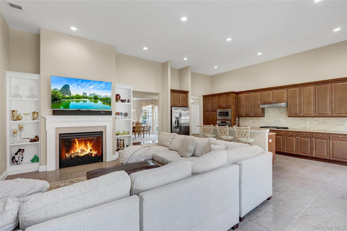 Fireplace, Interior, Kitchen, Living room, Recessed Lighting, Stainless Steel Appliances