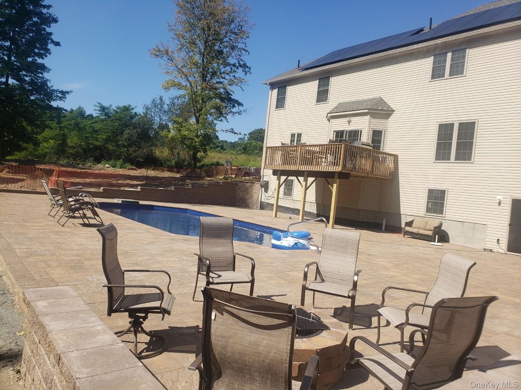 Exterior, Pool, Solar Panels