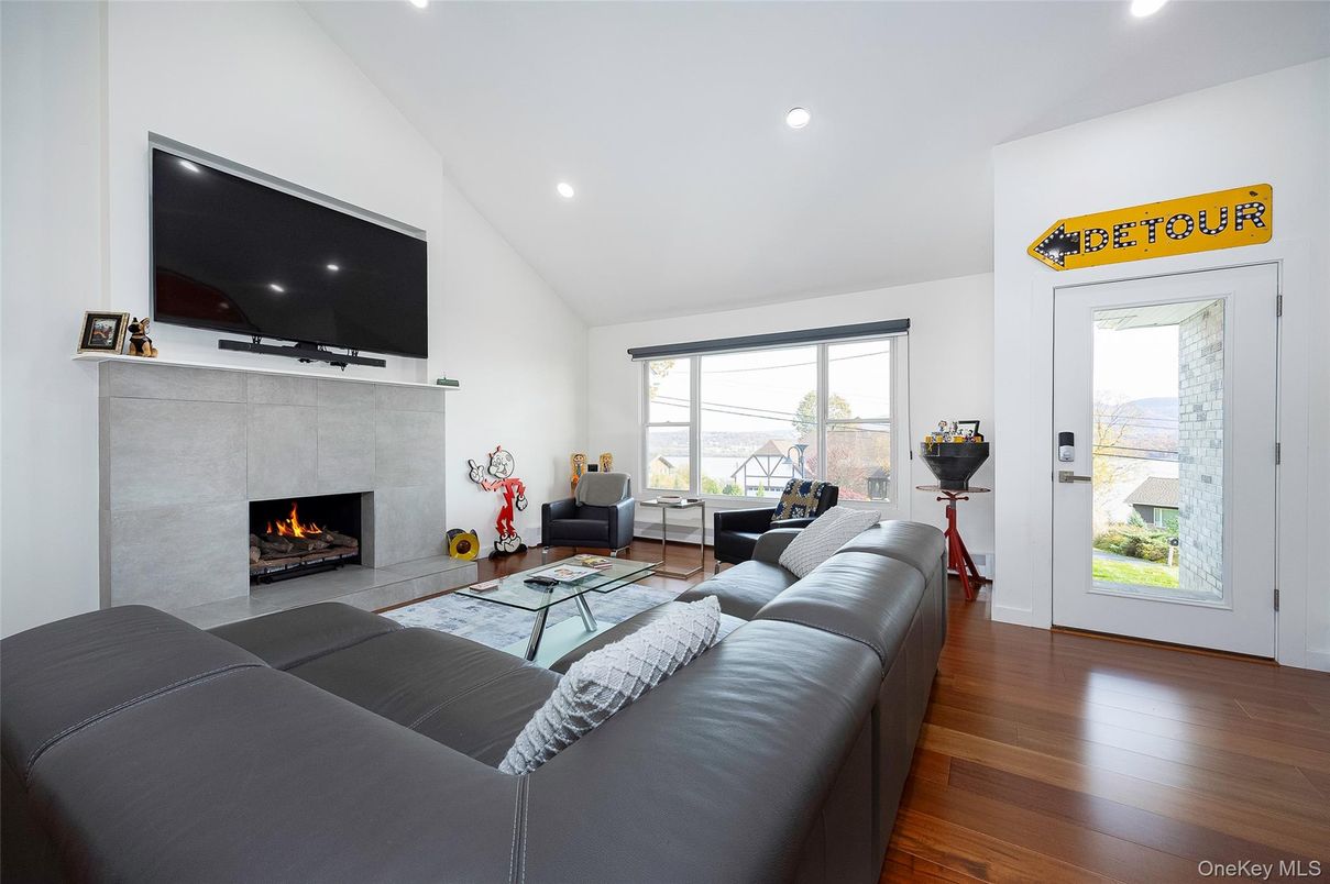 Fireplace, Interior, Living room, Recessed Lighting, Wood Texture Flooring