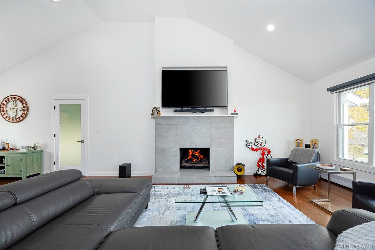 Fireplace, Interior, Living room, Recessed Lighting, Wood Texture Flooring