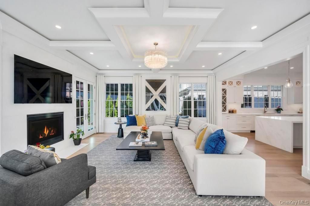 Chandelier, Fireplace, Interior, Living room, Recessed Lighting, Wood Texture Flooring