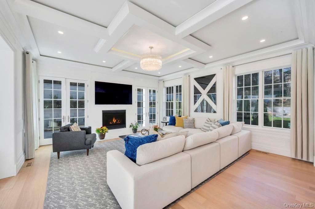 Chandelier, Fireplace, Interior, Living room, Recessed Lighting, Wood Texture Flooring