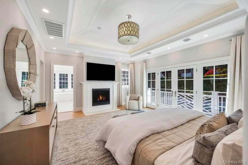 Bedroom, Fireplace, Interior, Pendant Lights, Recessed Lighting, Wood Texture Flooring