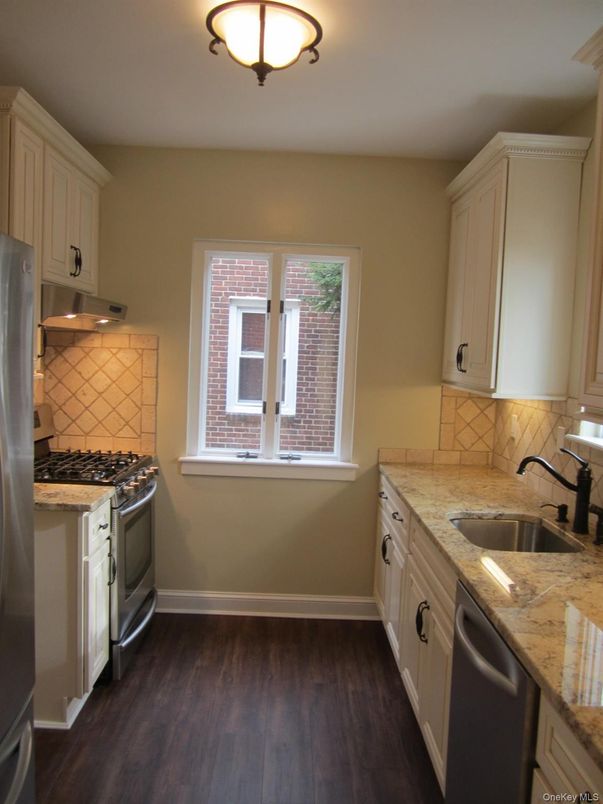 Interior, Kitchen, Tile Countertops, Wood Texture Flooring