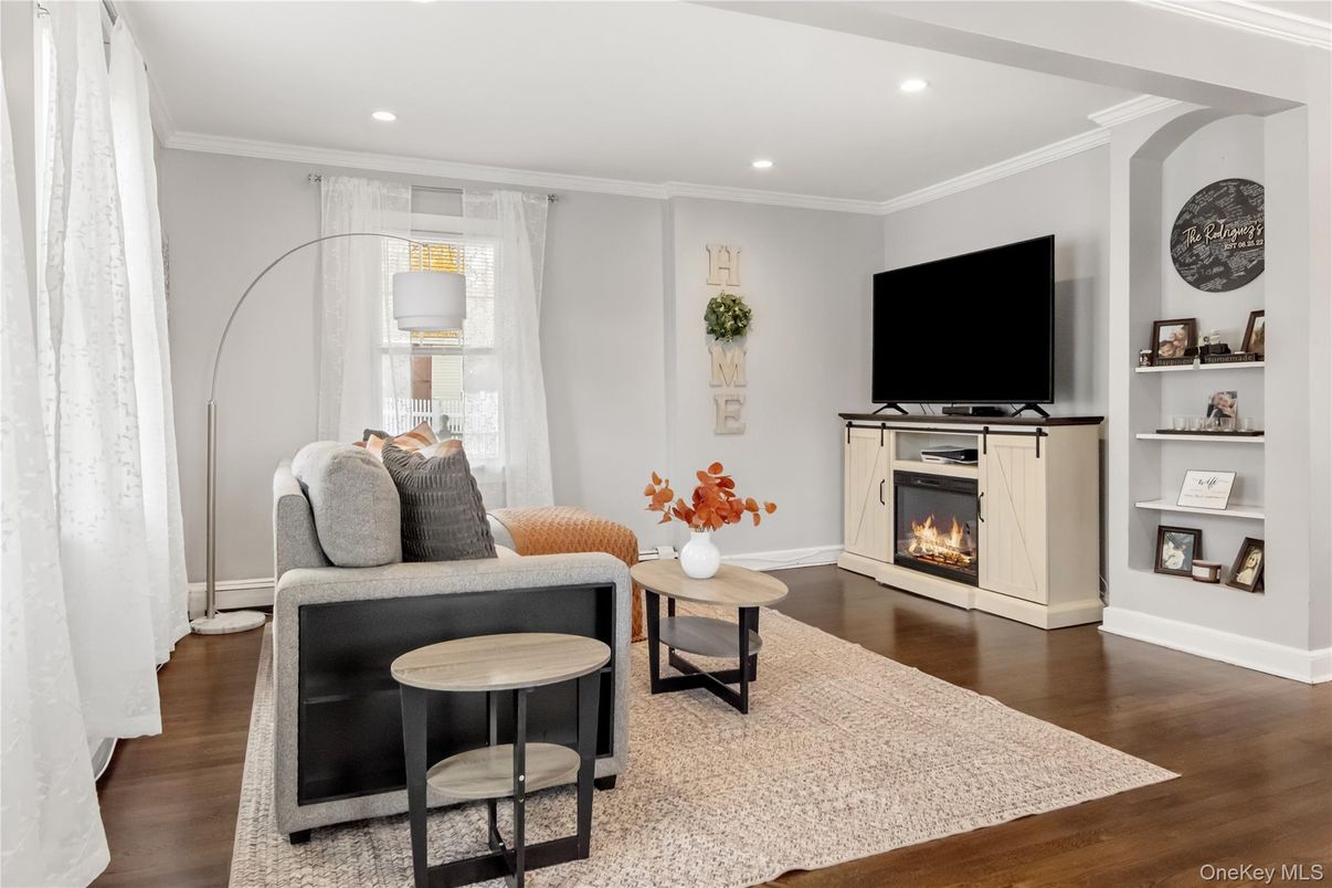 Fireplace, Interior, Living room, Recessed Lighting, Wood Texture Flooring