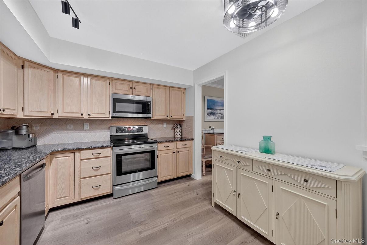 Interior, Kitchen, Stainless Steel Appliances, Tile Countertops, Wood Texture Flooring