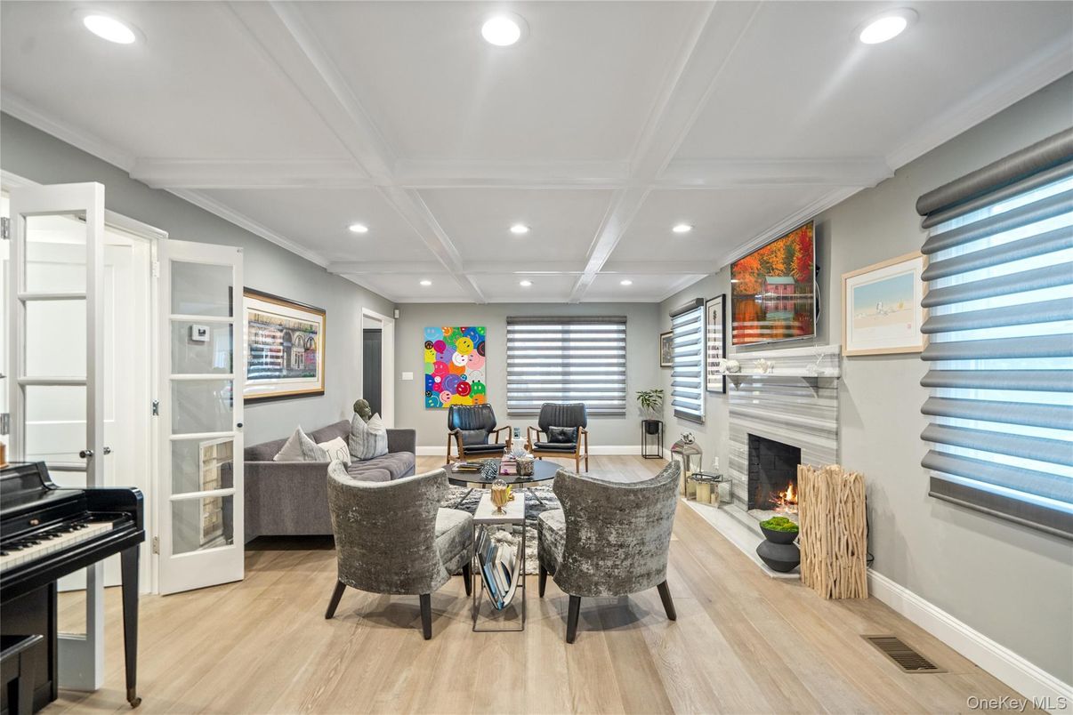 Fireplace, Interior, Living room, Piano, Recessed Lighting, Wood Texture Flooring