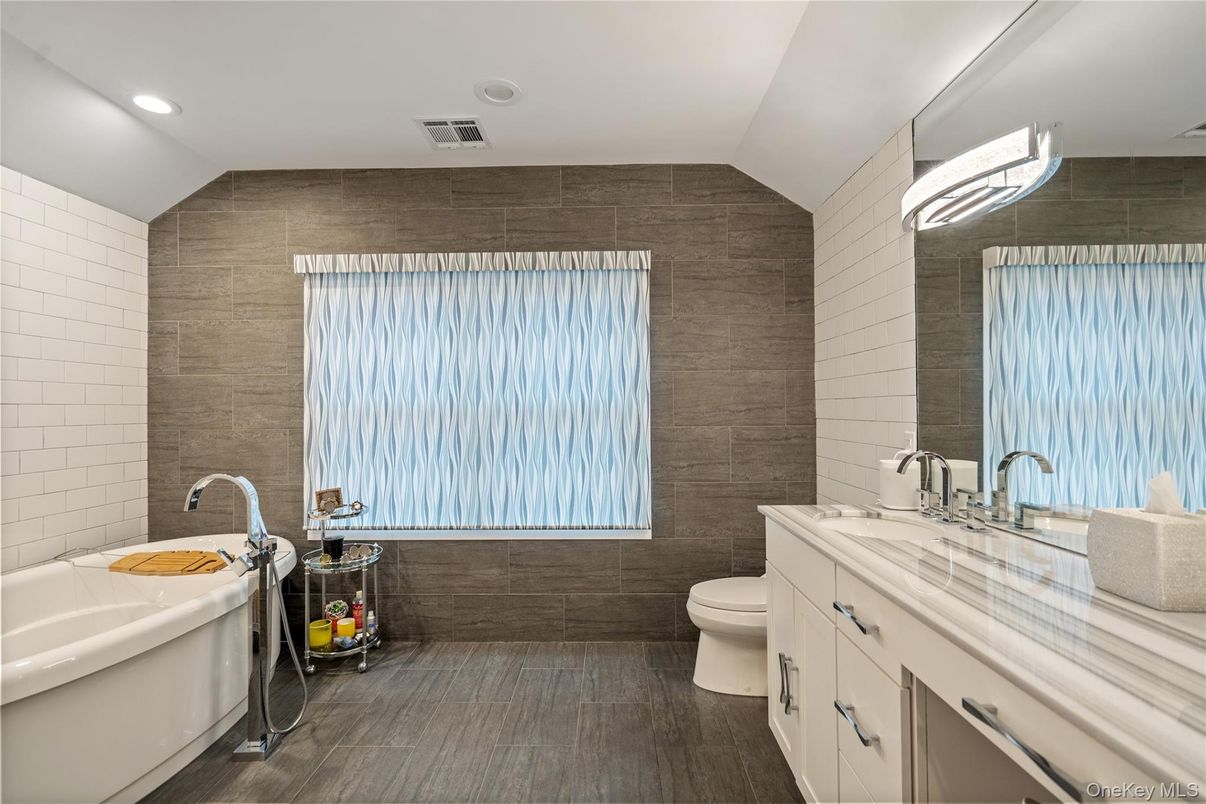 Bathroom, Dual Sink Vanities, Interior, Recessed Lighting, Wood Texture Flooring
