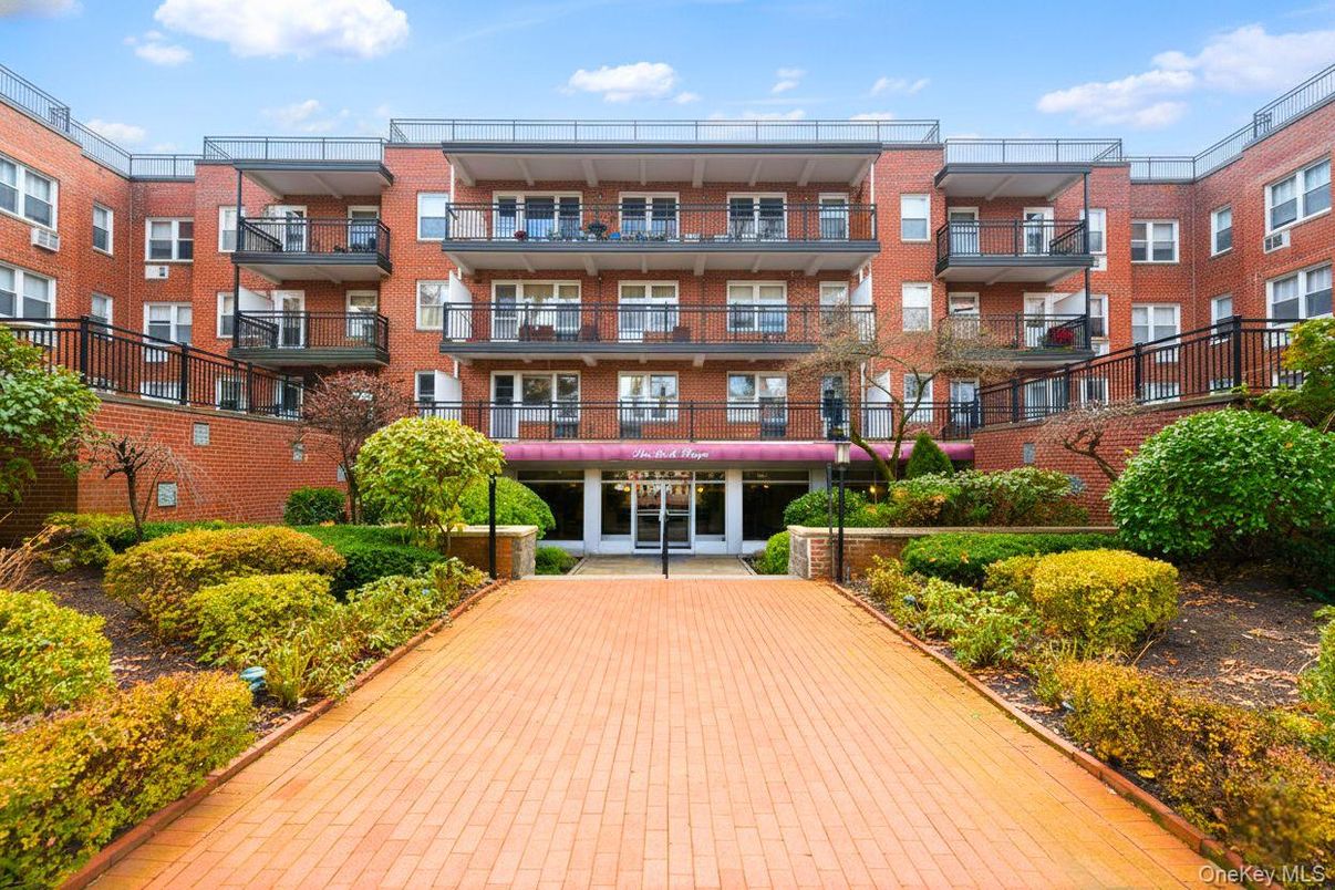 Exterior, Facade, Brick Facade, Condo Building