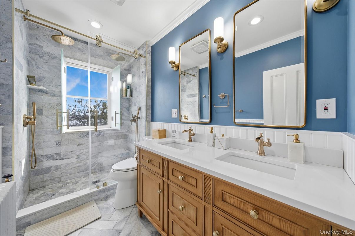 Bathroom, Dual Sink Vanities, Glass Shower, Interior, Marble, Marble Walls, Recessed Lighting