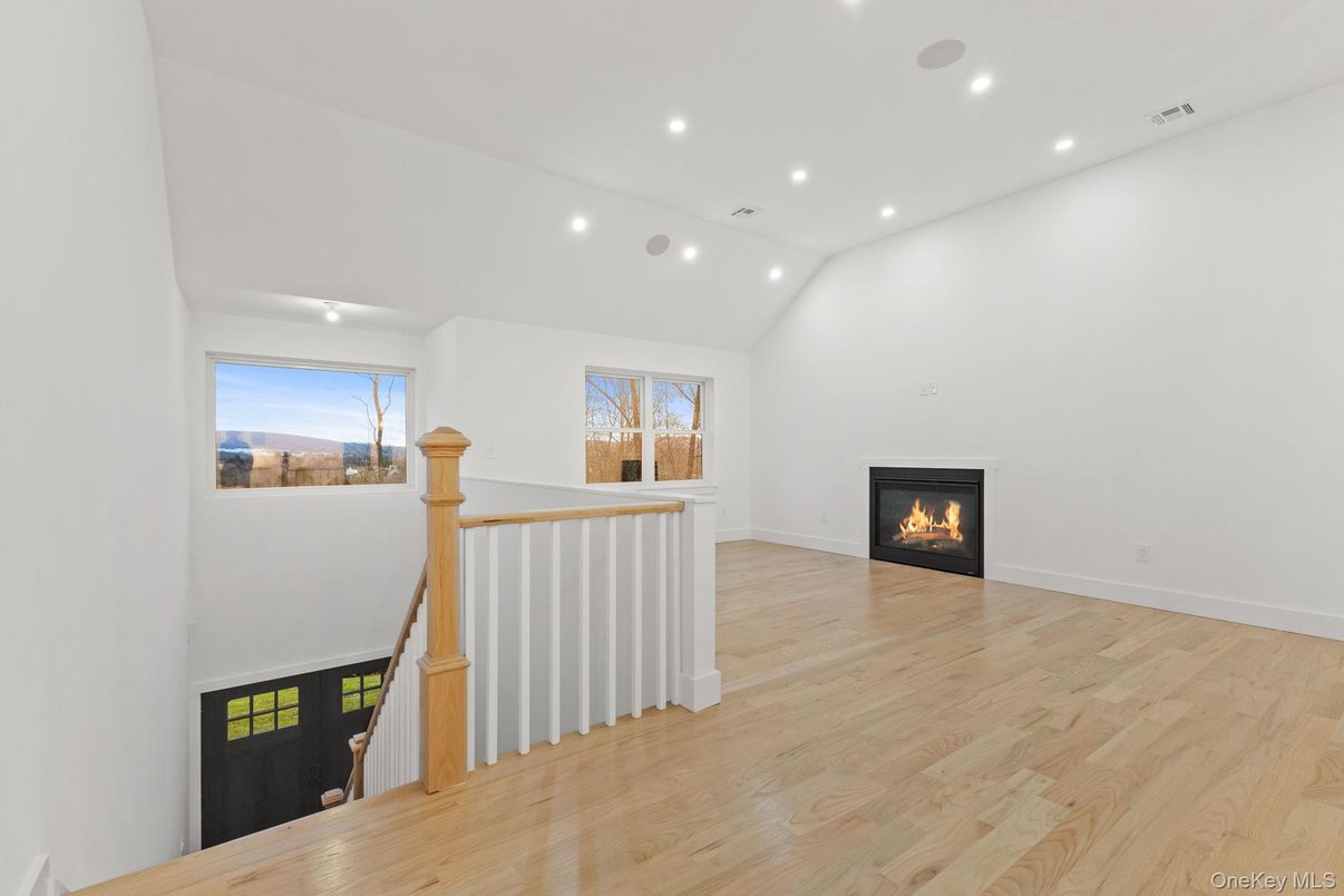 Empty room, Fireplace, Interior, Recessed Lighting, Wood Texture Flooring