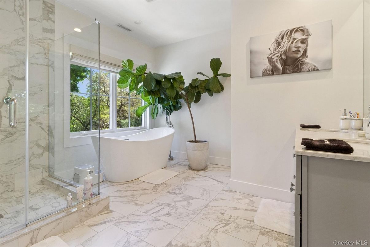 Bathroom, Free Standing Baths, Glass Shower, Interior, Marble, Marble Walls, Recessed Lighting