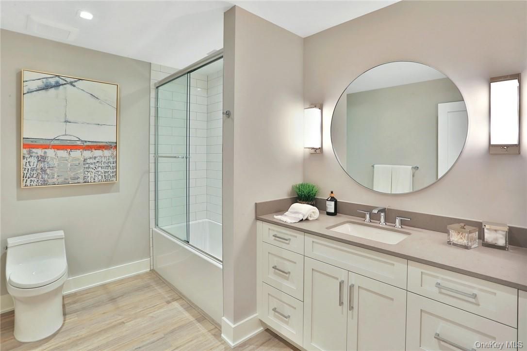 Bathroom, Glass Shower, Interior, Recessed Lighting, Wood Texture Flooring