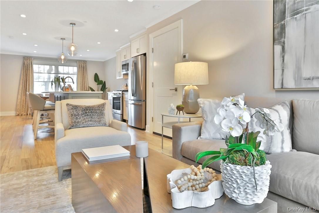 Dining room, Interior, Kitchen, Living room, Pendant Lights, Recessed Lighting, Stainless Steel Appliances, Wood Texture Flooring