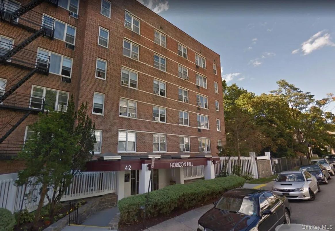 Exterior, Facade, Brick Facade, Condo Building