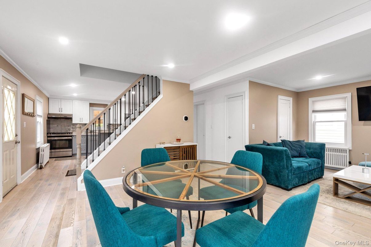 Dining room, Interior, Kitchen, Living room, Recessed Lighting, Stainless Steel Appliances, Wood Texture Flooring