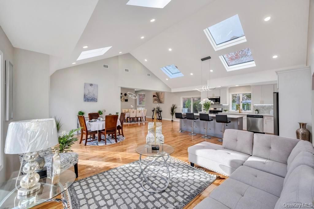 Dining room, Interior, Kitchen, Living room, Pendant Lights, Recessed Lighting, Stainless Steel Appliances, Wood Texture Flooring