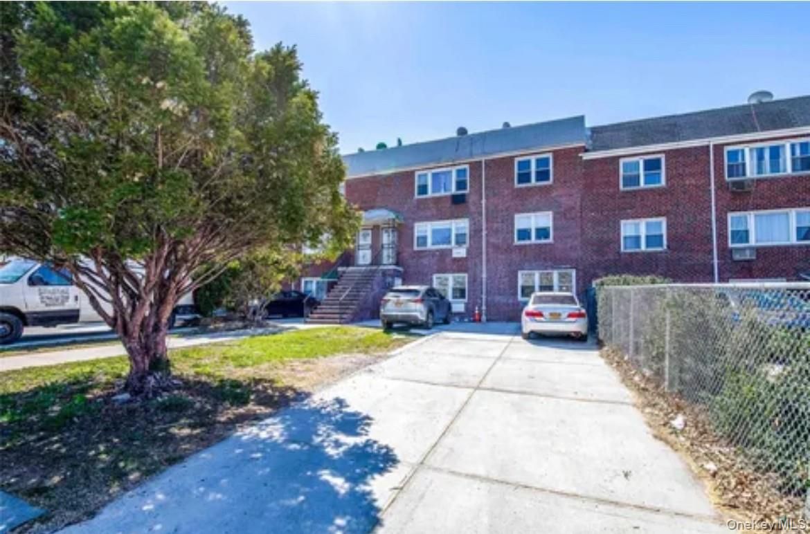 Exterior, Facade, Brick Facade, Condo Building