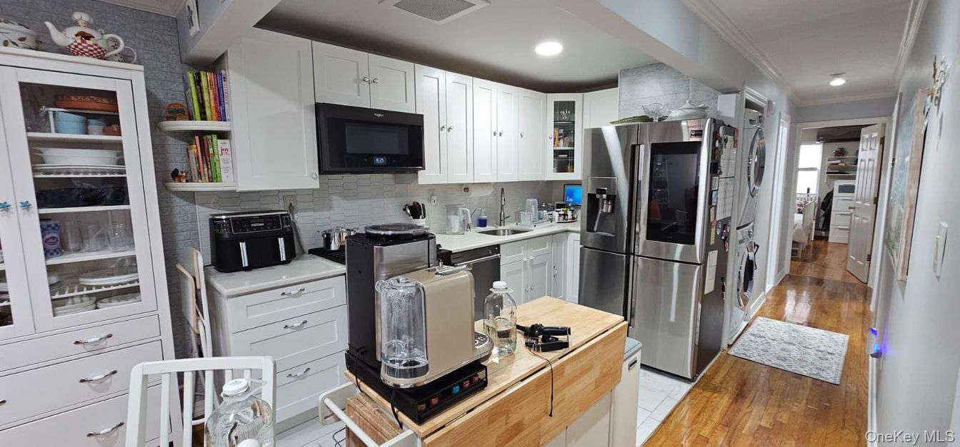 Interior, Kitchen, Recessed Lighting, Stainless Steel Appliances, Stone Walls, Wood Texture Flooring