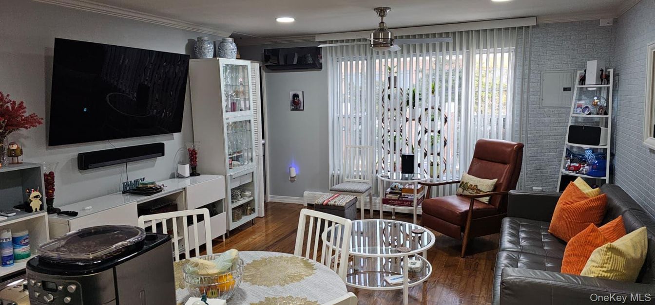 Fireplace, Interior, Living room, Recessed Lighting, Stone Walls, Wood Texture Flooring