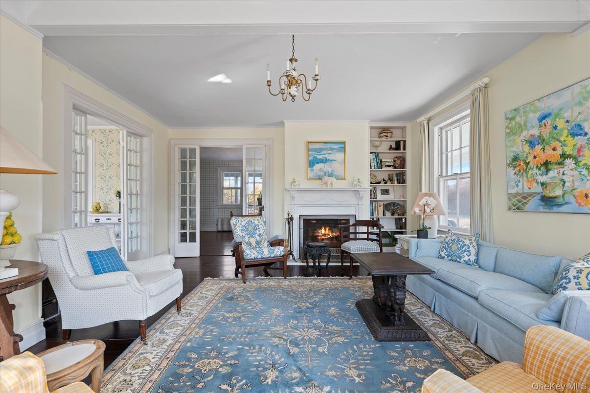 Chandelier, Fireplace, Interior, Living room, Recessed Lighting, Wood Texture Flooring