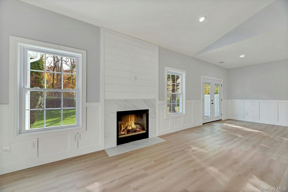 Empty room, Fireplace, Interior, Recessed Lighting, Wood Texture Flooring