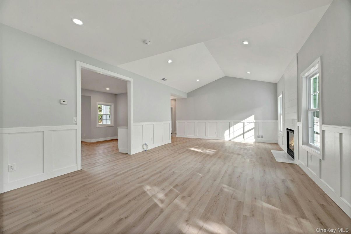 Empty room, Fireplace, Interior, Recessed Lighting, Wood Texture Flooring