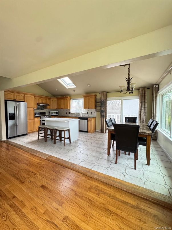 Chandelier, Dining room, Interior, Kitchen, Stainless Steel Appliances, Wood Texture Flooring
