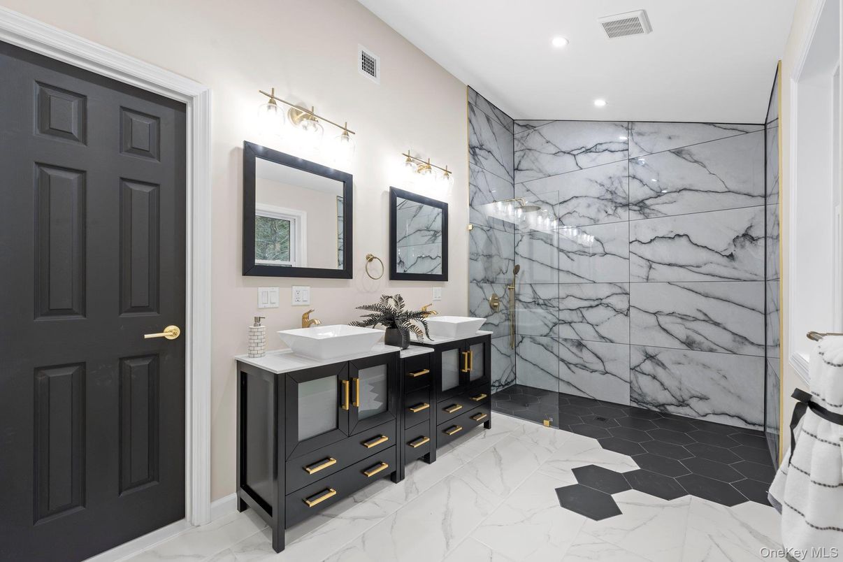 Bathroom, Dual Sink Vanities, Interior, Marble, Marble Walls, Recessed Lighting