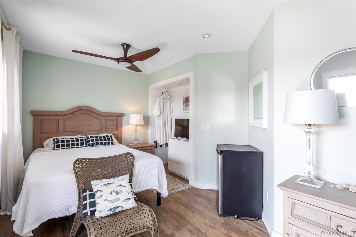 Bedroom, Fireplace, Interior, Recessed Lighting, Wood Texture Flooring