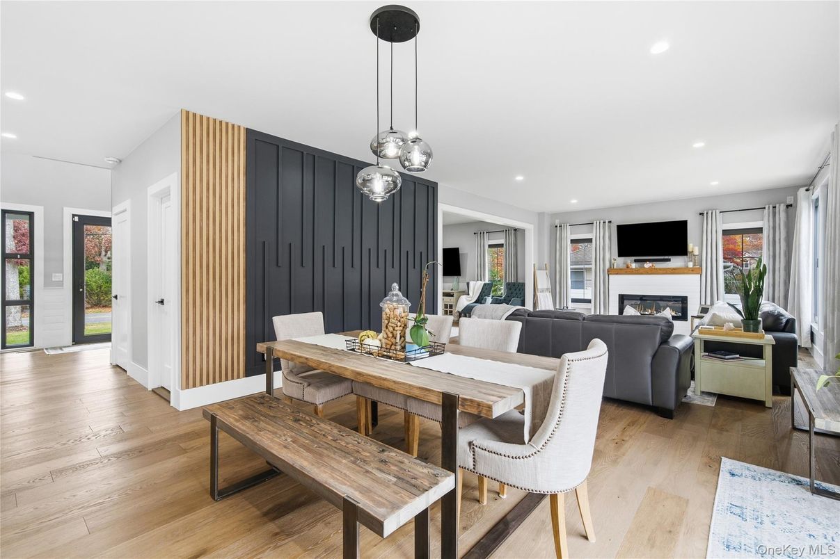 Dining room, Fireplace, Interior, Living room, Pendant Lights, Recessed Lighting, Wood Texture Flooring