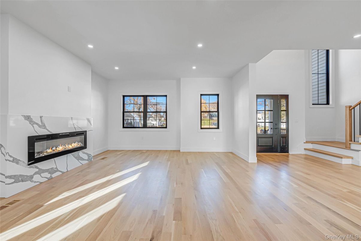 Empty room, Fireplace, Interior, Recessed Lighting, Wood Texture Flooring