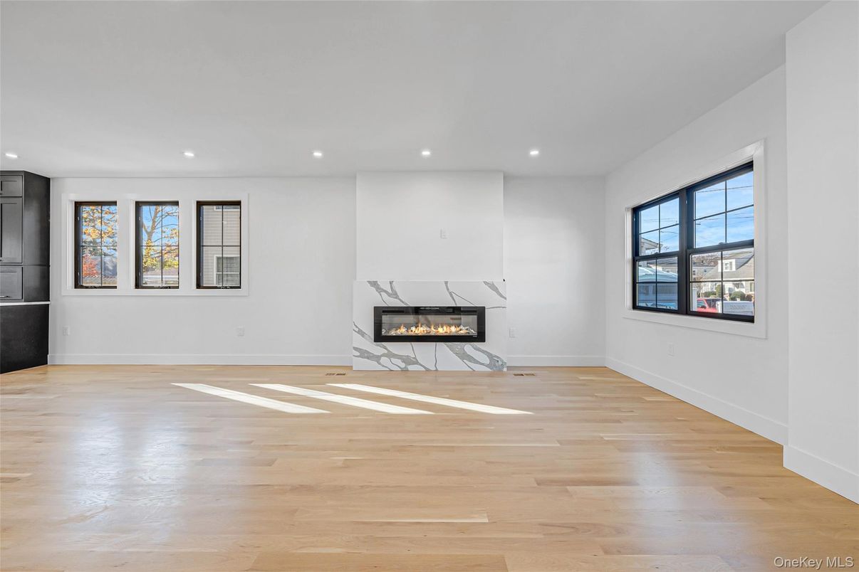 Empty room, Fireplace, Interior, Recessed Lighting, Wood Texture Flooring