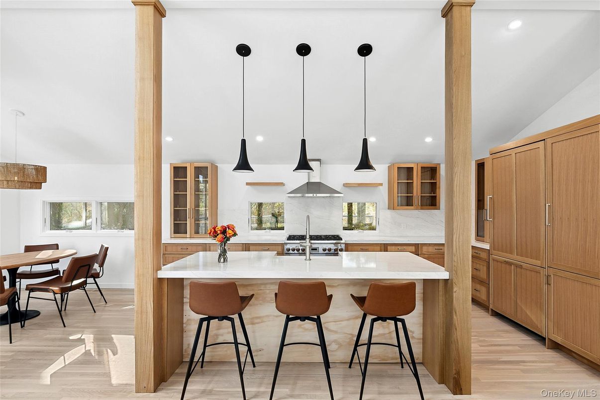 Dining room, Interior, Kitchen, Pendant Lights, Recessed Lighting, Stainless Steel Appliances, Wood Texture Flooring
