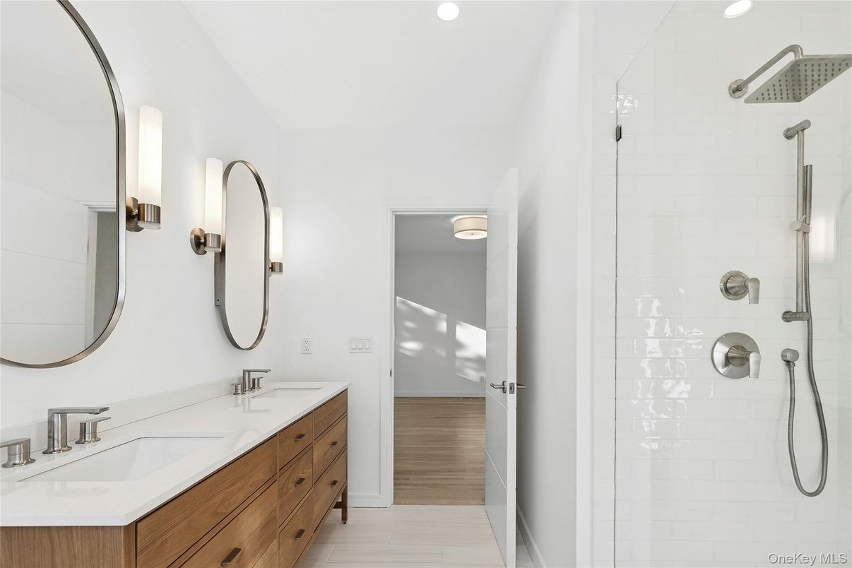 Bathroom, Dual Sink Vanities, Glass Shower, Interior, Recessed Lighting, Wood Texture Flooring