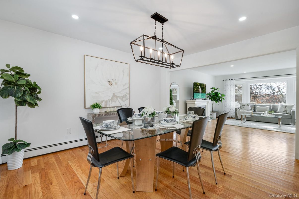 Dining room, Fireplace, Interior, Living room, Pendant Lights, Recessed Lighting, Wood Texture Flooring